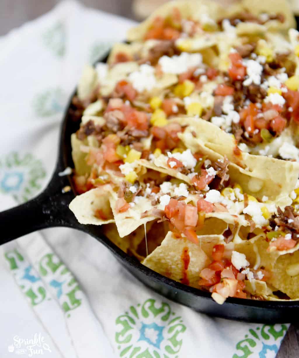 These make such a great appetizer for a dinner party or family meal! The smoky beef really adds a lot of flavor to these Brisket Nachos! yum!