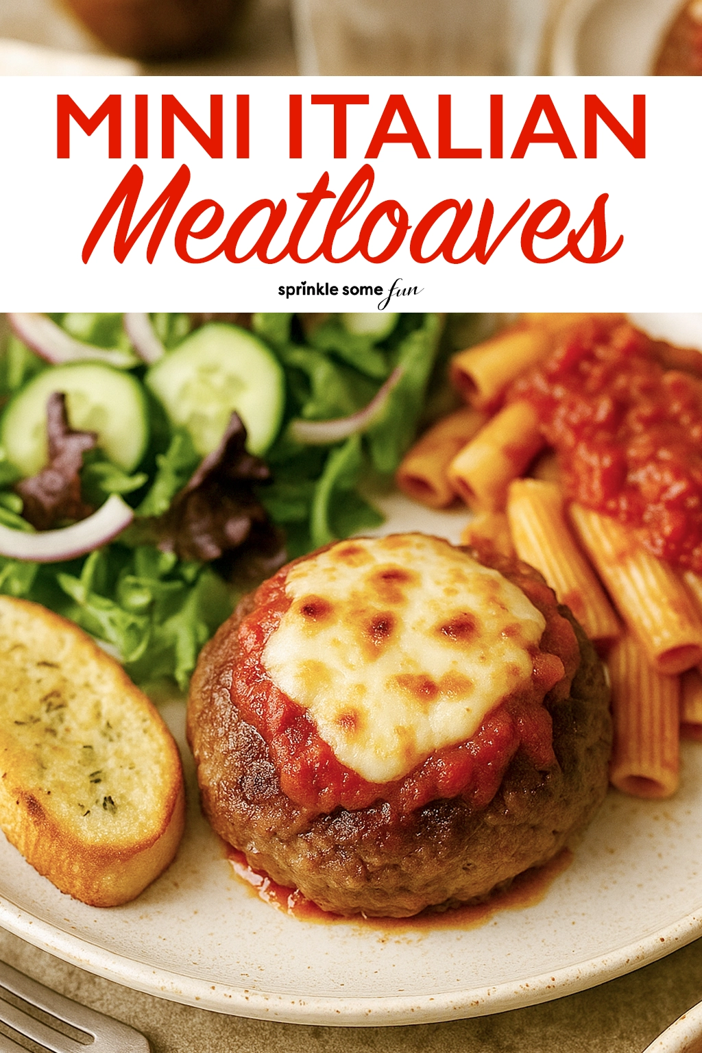 Mini Italian Meatloaf with salad, garlic bread and pasta on a plate. Easy dinner idea.