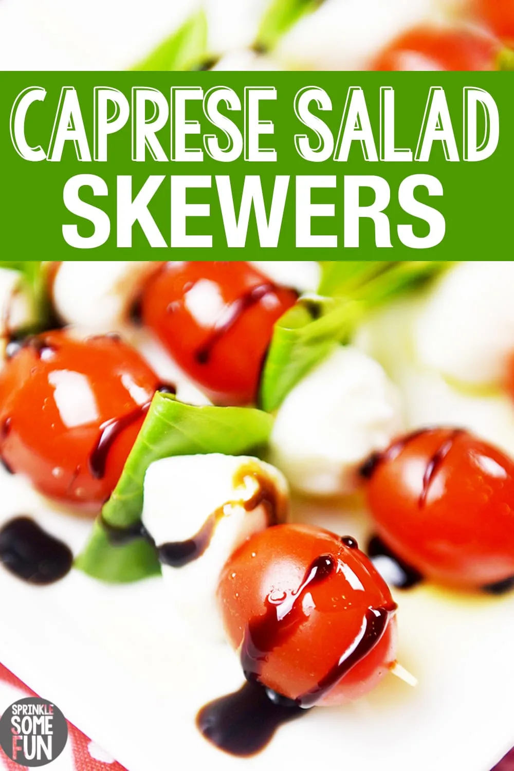Caprese skewers with tomato, mozzarella, basil and balsamic glaze. 